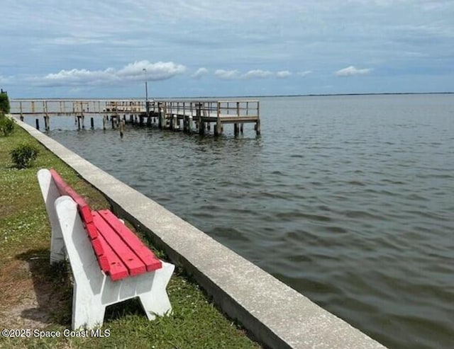 view of dock with a water view