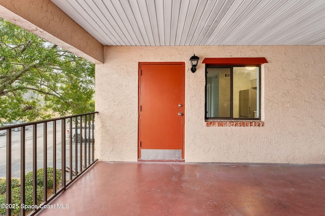 doorway to property with a balcony