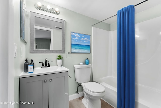 full bathroom with vanity, toilet, tile patterned flooring, and shower / tub combo