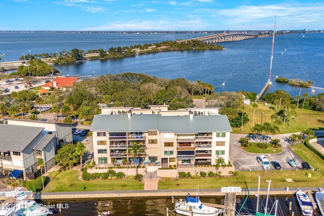 drone / aerial view with a water view