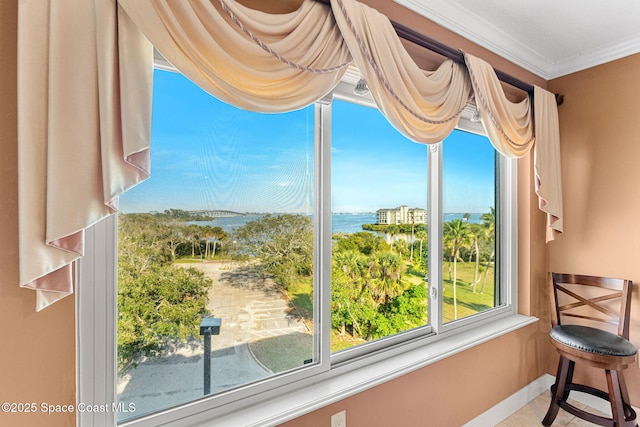 sunroom / solarium with a water view