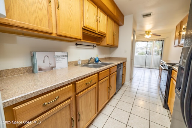 kitchen featuring dishwashing machine, sink, light tile patterned floors, ceiling fan, and black electric range