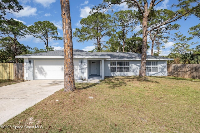 single story home featuring a garage and a front yard