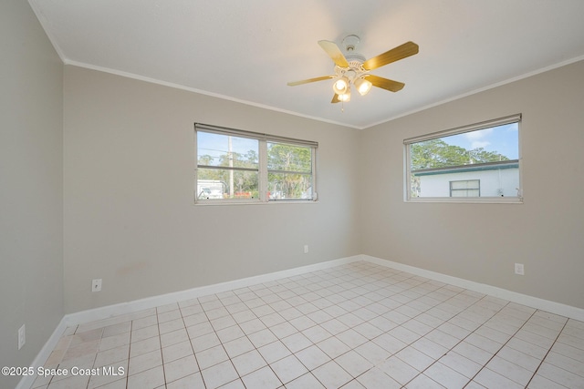 empty room with ornamental molding and ceiling fan