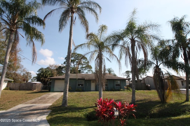 single story home featuring a garage, driveway, a front lawn, and fence