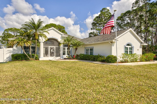 ranch-style house featuring a front yard