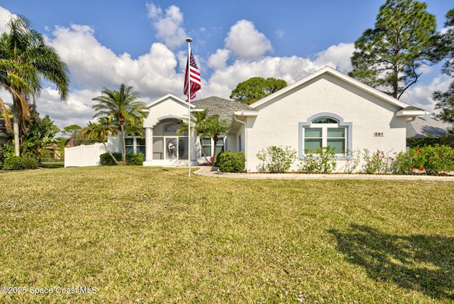 ranch-style house with a front lawn