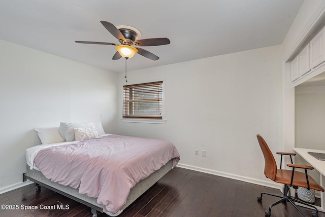 bedroom with dark wood-type flooring and ceiling fan