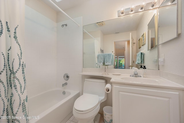 full bathroom featuring vanity, shower / bath combo with shower curtain, and toilet