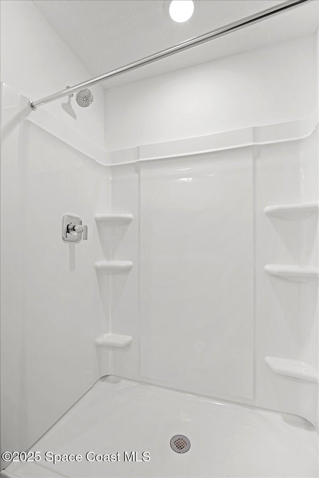 1305 Harper Blvd SW, Palm Bay, FL 32908 - full bathroom featuring a shower