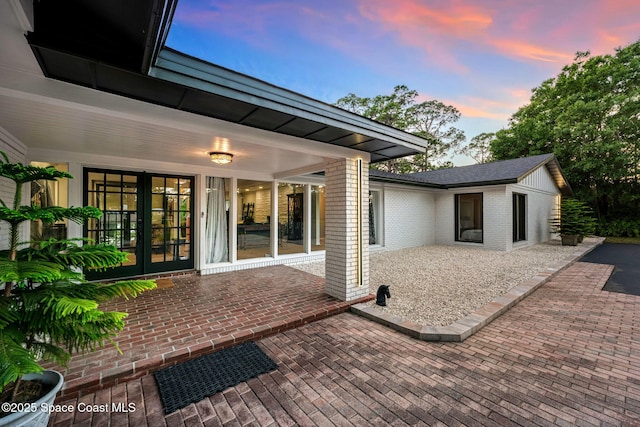 patio terrace at dusk with french doors