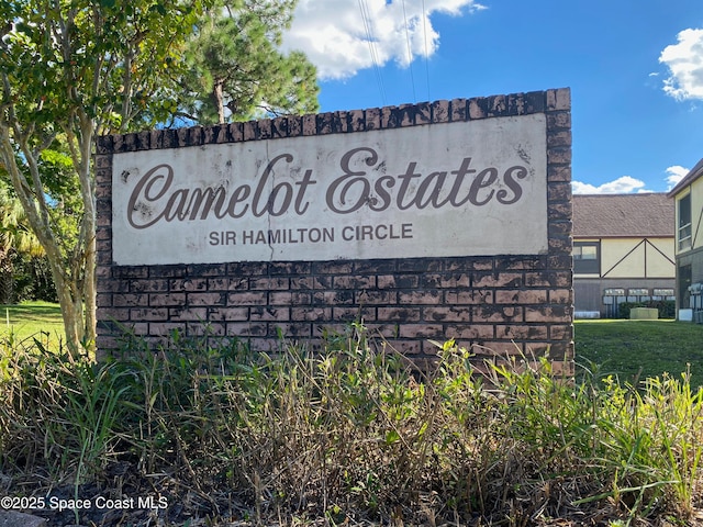 view of community sign