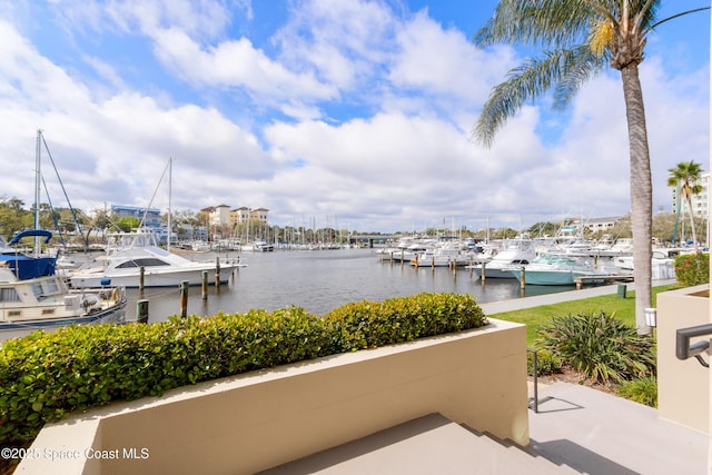 property view of water featuring a boat dock