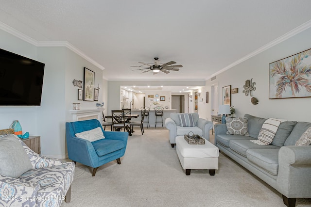 living room featuring carpet, visible vents, ceiling fan, and crown molding