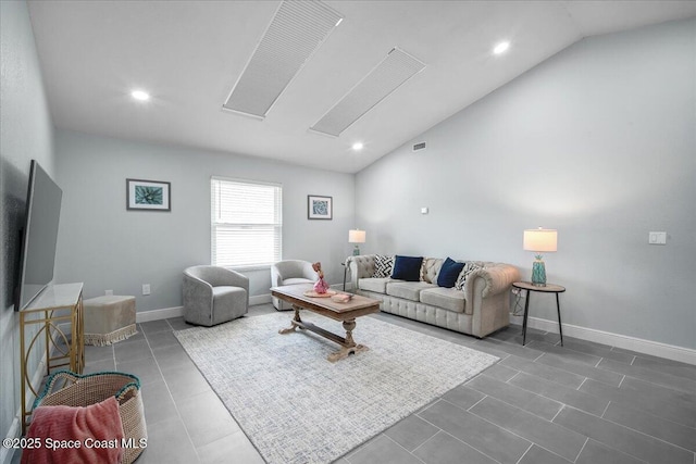 tiled living room featuring high vaulted ceiling