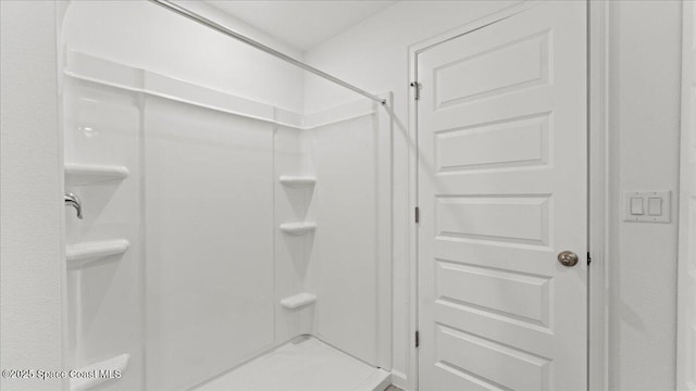 bathroom with walk in shower