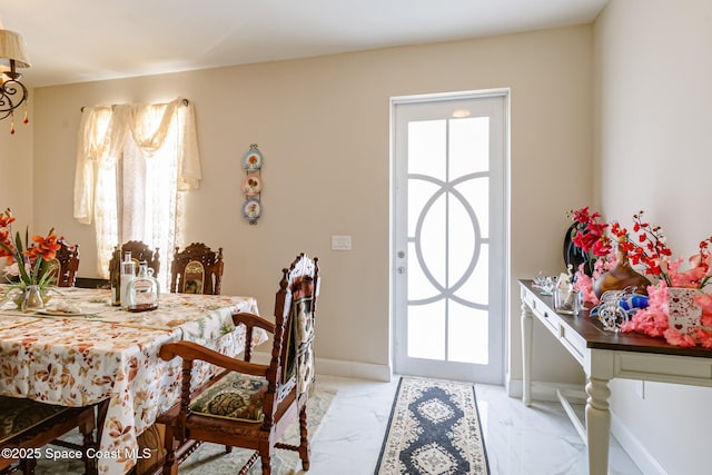 dining area with a wealth of natural light