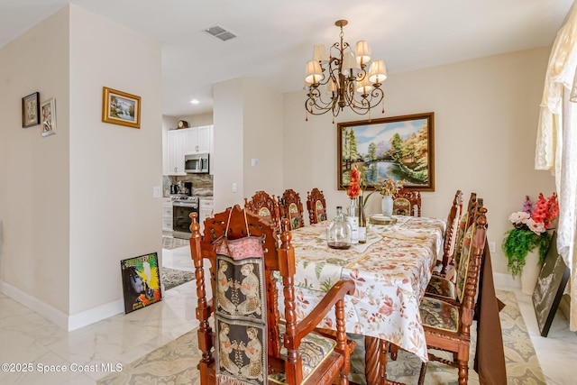 dining area featuring a chandelier