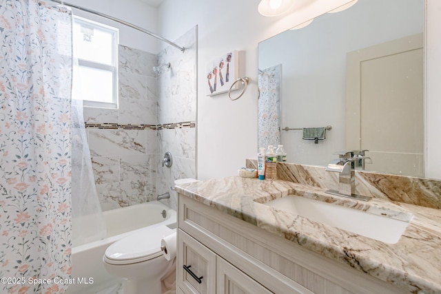 full bathroom with vanity, toilet, and shower / bath combo