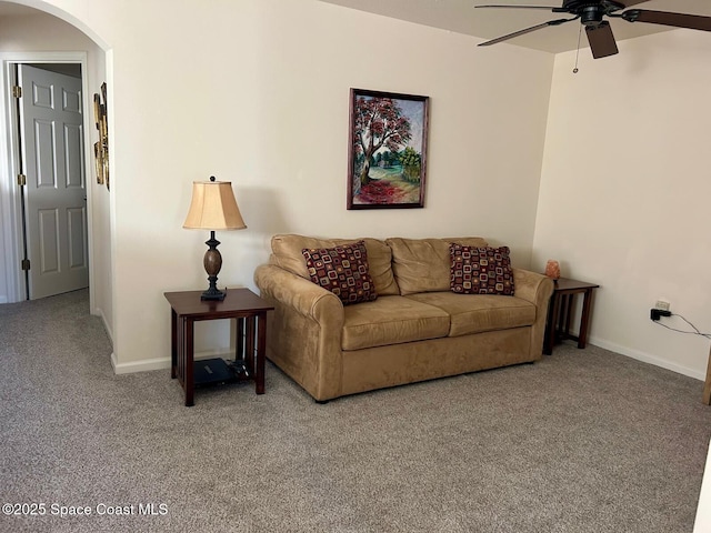 living room with carpet floors and ceiling fan