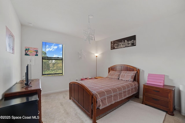 bedroom with light carpet