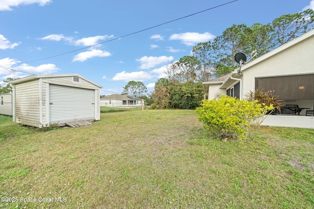 view of yard featuring a storage shed