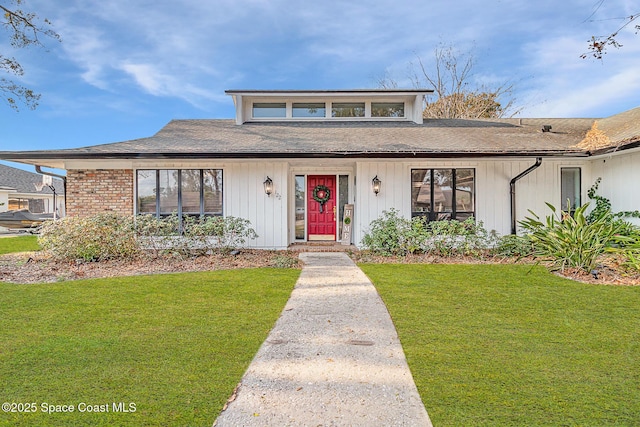 view of front of house with a front yard