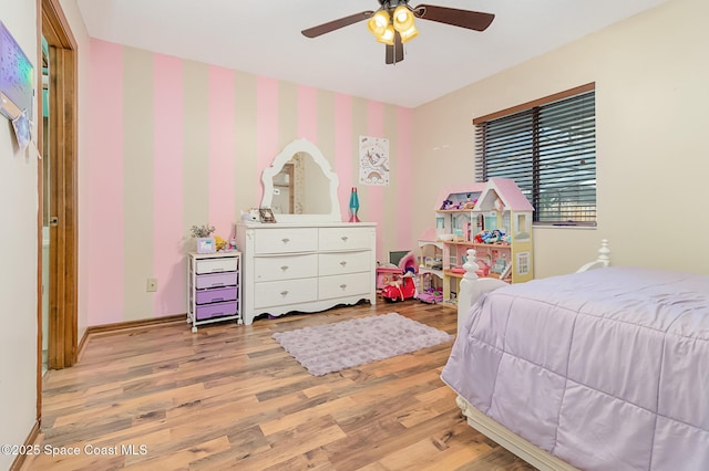 bedroom featuring ceiling fan and light hardwood / wood-style floors