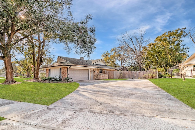 view of front facade featuring a garage and a front yard