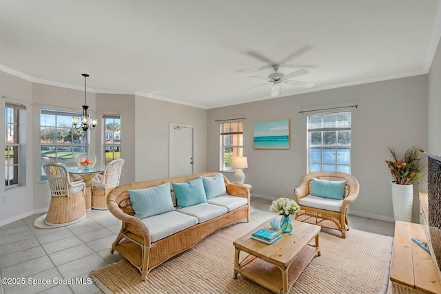 living room with crown molding, ceiling fan with notable chandelier, and light tile patterned flooring