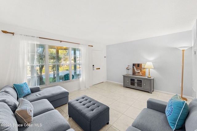 living room featuring light tile patterned floors