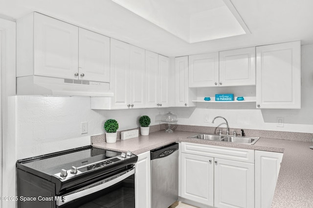 kitchen featuring stainless steel appliances, sink, and white cabinets