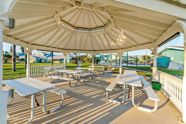 surrounding community featuring a gazebo and a yard