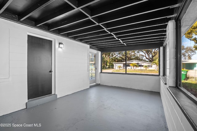 view of unfurnished sunroom