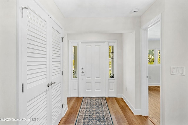 foyer entrance featuring light wood-type flooring