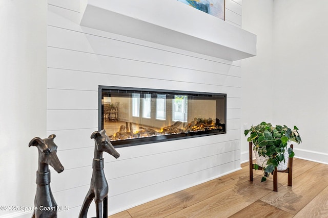 interior details with hardwood / wood-style flooring