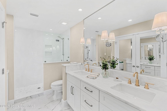 bathroom with french doors, vanity, tiled shower, and toilet