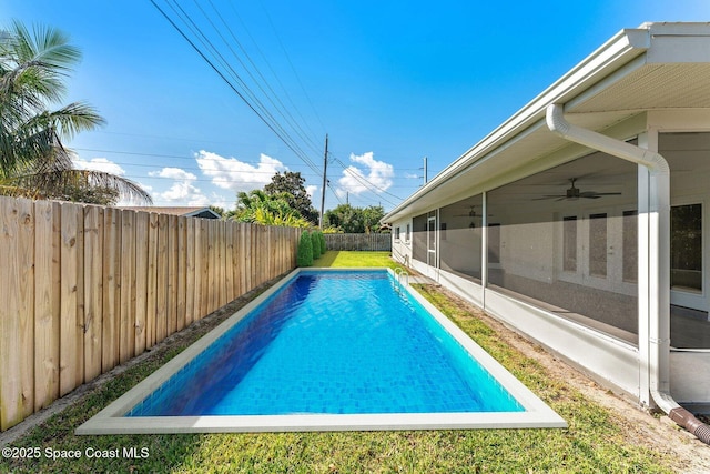 view of swimming pool with ceiling fan