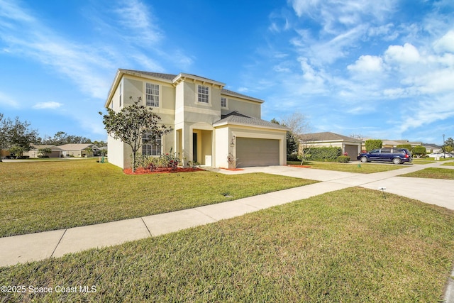 view of front of house featuring a garage and a front lawn