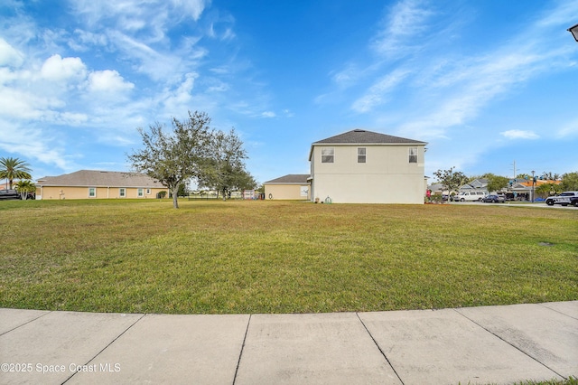 view of property exterior featuring a lawn