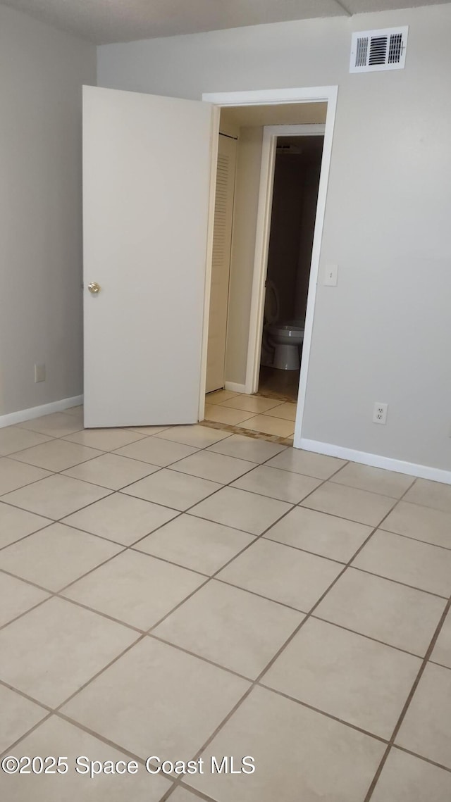 view of tiled spare room