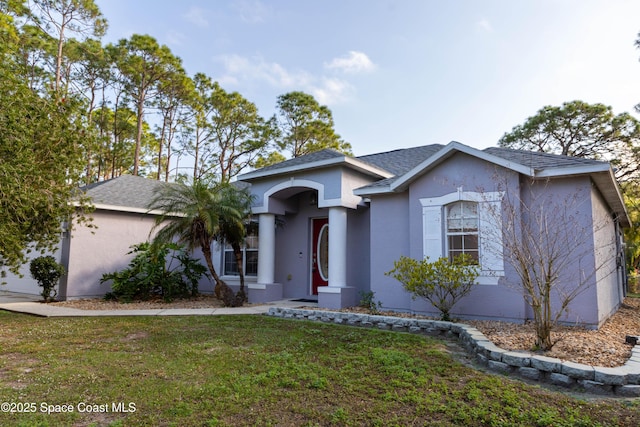 view of front of house with a front yard