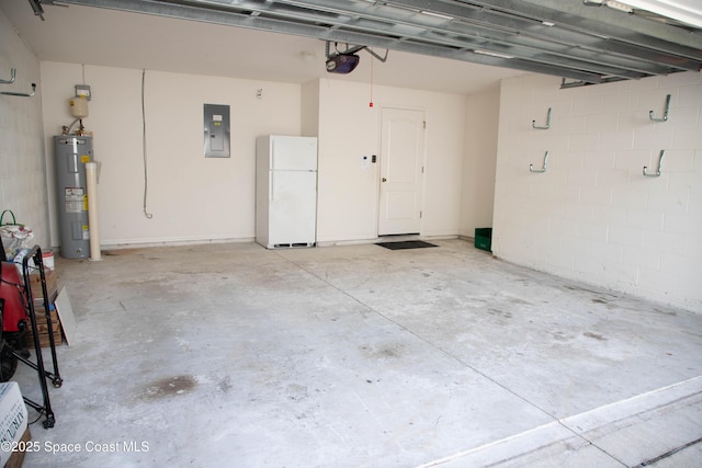 garage featuring white refrigerator, a garage door opener, electric panel, and electric water heater