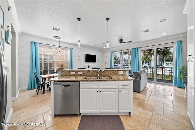 kitchen with sink, dishwasher, a kitchen island with sink, white cabinets, and decorative light fixtures