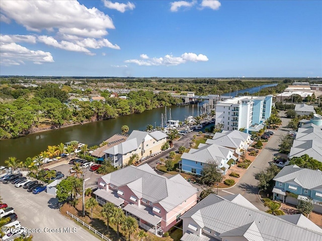 bird's eye view with a water view