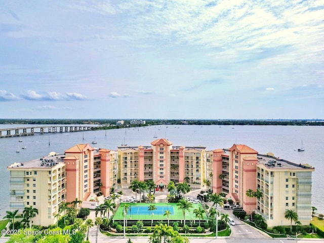 view of building exterior featuring a water view