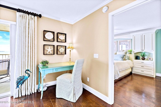 office space with dark wood finished floors, crown molding, and baseboards