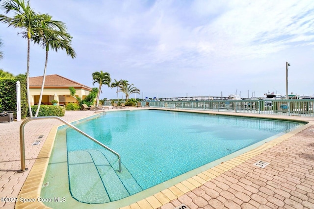 view of pool featuring a patio