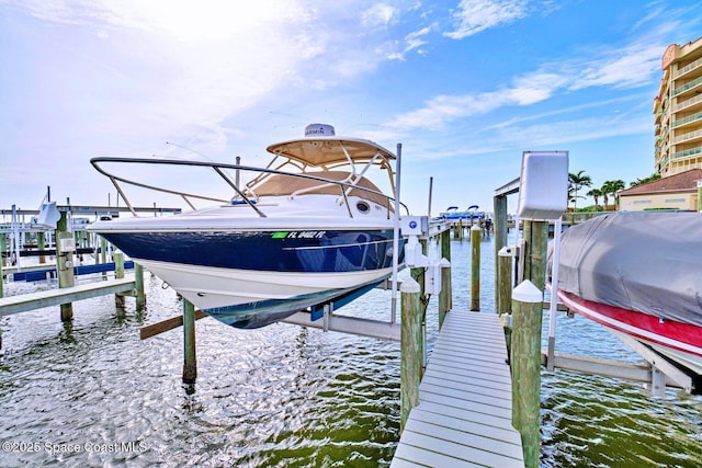 dock area featuring a water view