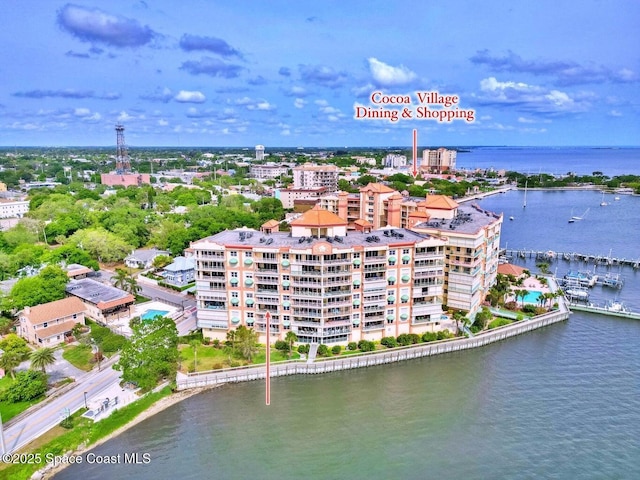 drone / aerial view with a water view